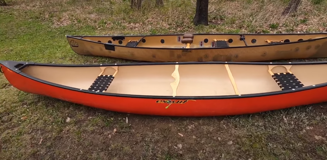 Two canoes on the grass