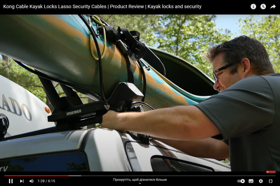 The lock that holds the kayak on the trunk