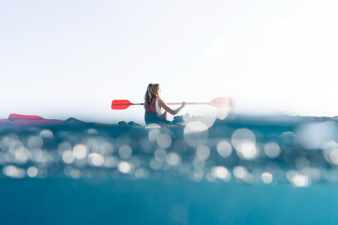 Woman traveling by canoe