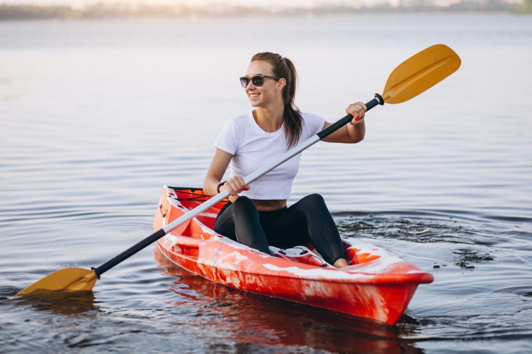 A woman paddling a kayak